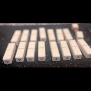 Empty white square lipstick tubes